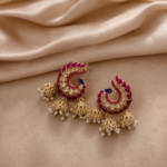 Mayura Maroon Jhumka Earrings